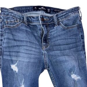 Mid rise distressed skinny jeans